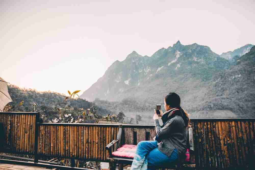 young woman taking photo